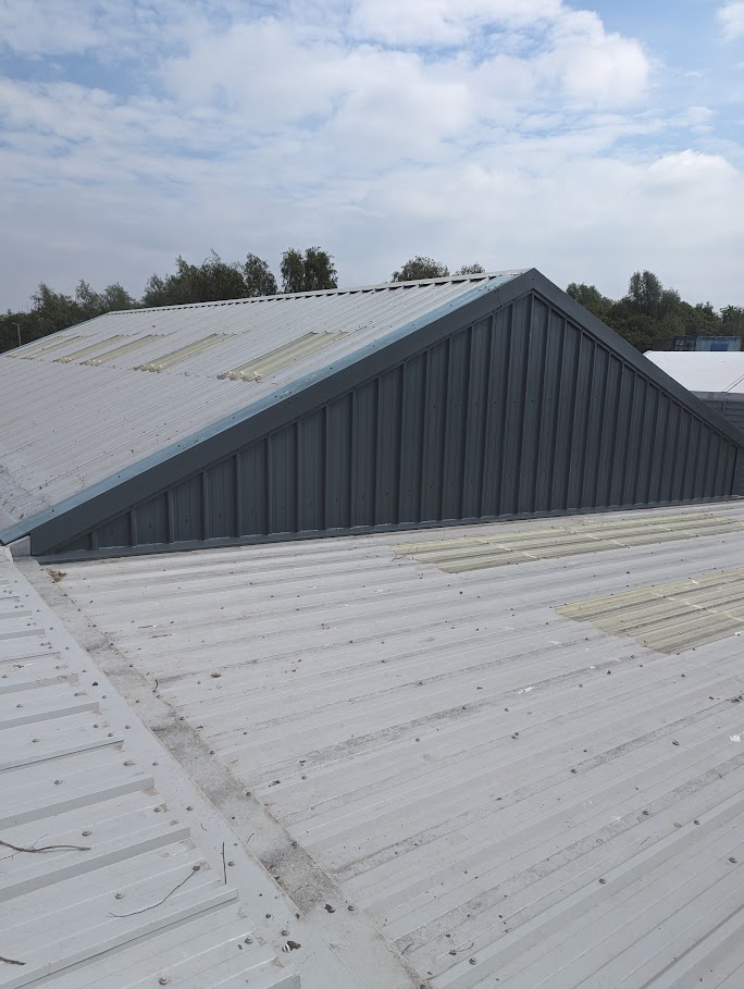 Factory roof resprayed by Commercial Spraying experts in North Wales